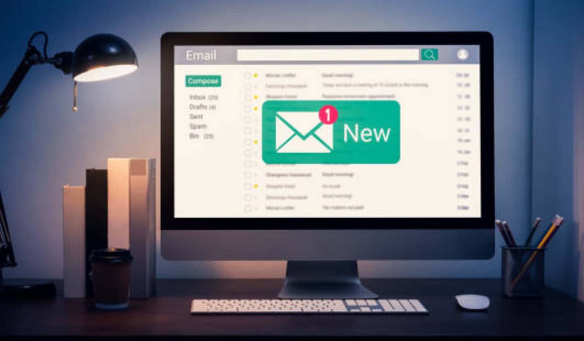 New email alert on computer, communication connection message to global letters in the workplace.